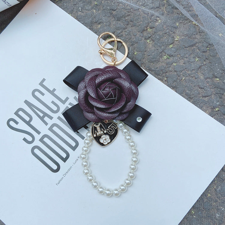 Wholesale PU Bow Camellia Keychain
